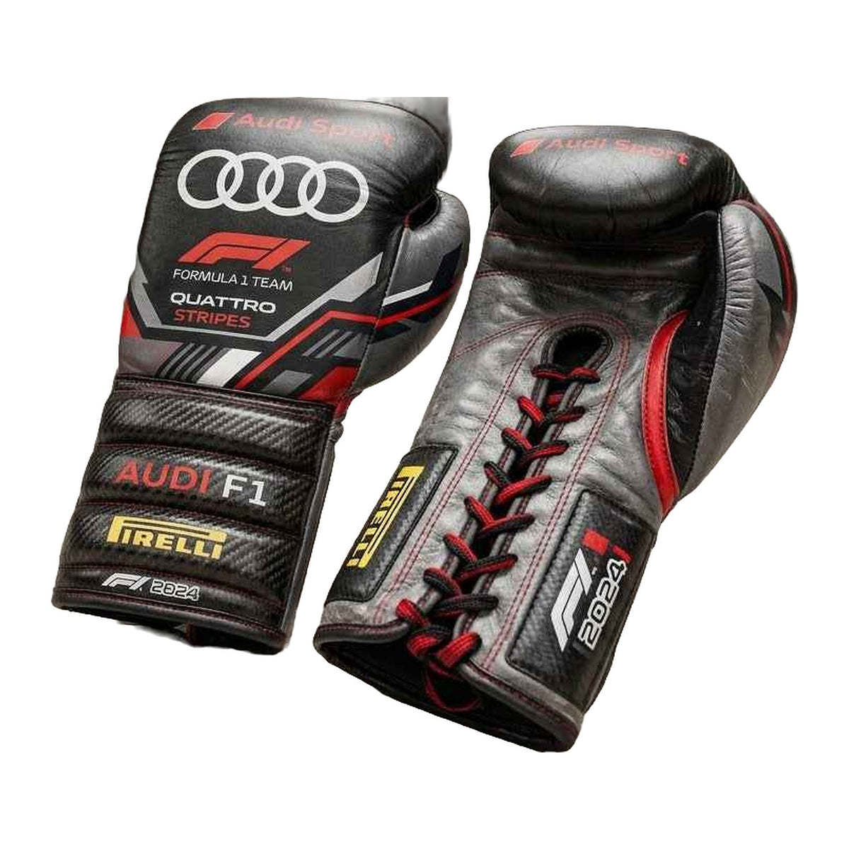 Matte black boxing gloves side profile showing contrast stitching