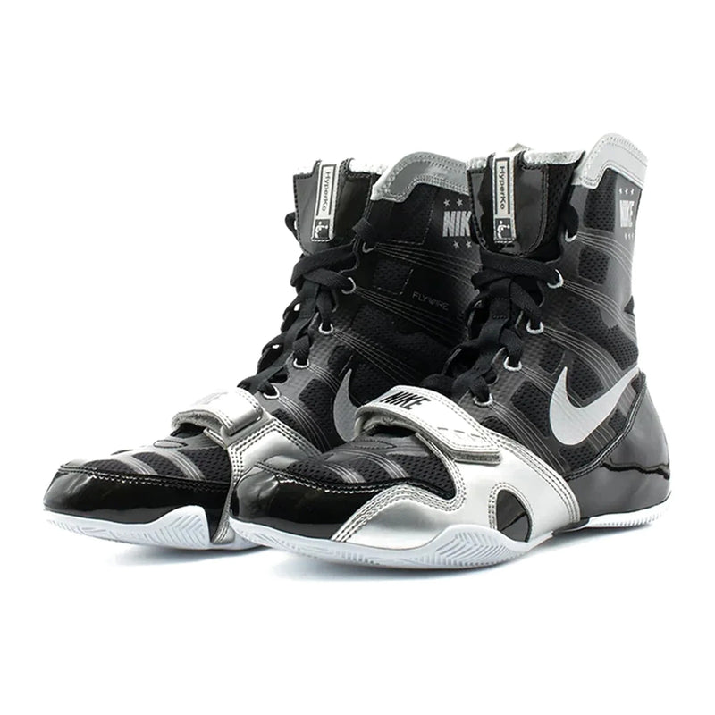A pair of Custom Nike HyperKO boxing shoes in a black and silver colorway, featuring a forefoot lockdown strap and Nike Swoosh