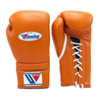 Gold and tan leather lace-up boxing training gloves from the sparring set