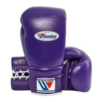 Purple lace-up Winning boxing gloves on a white background