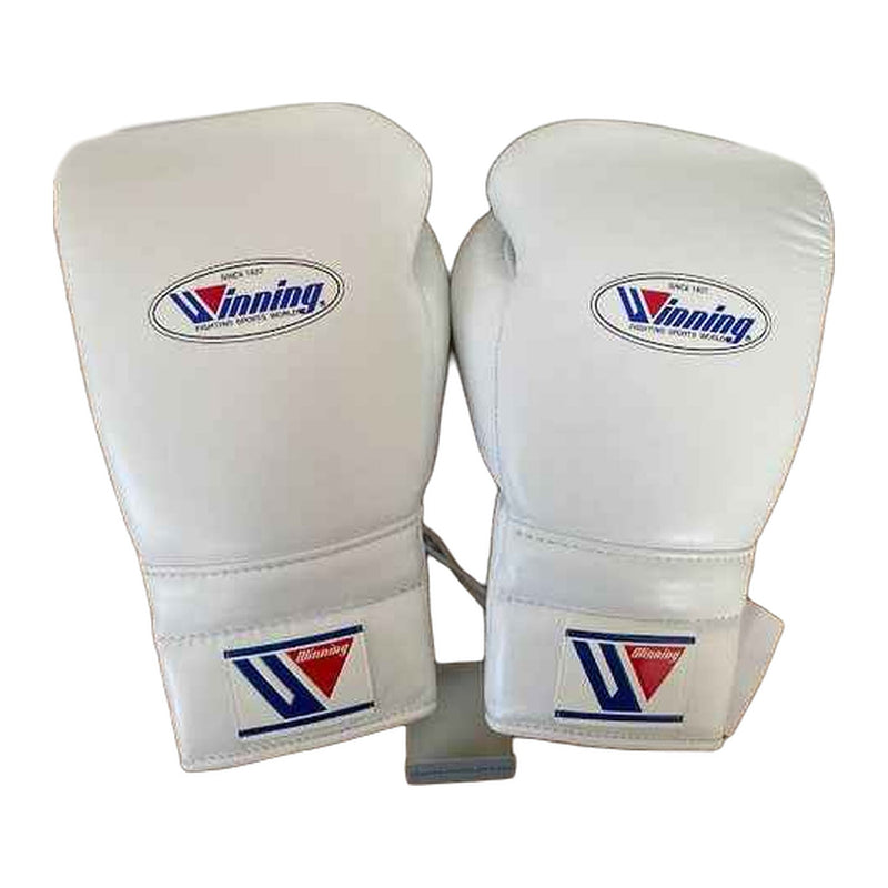 Front and side view of white Winning lace-up boxing gloves with oval logo